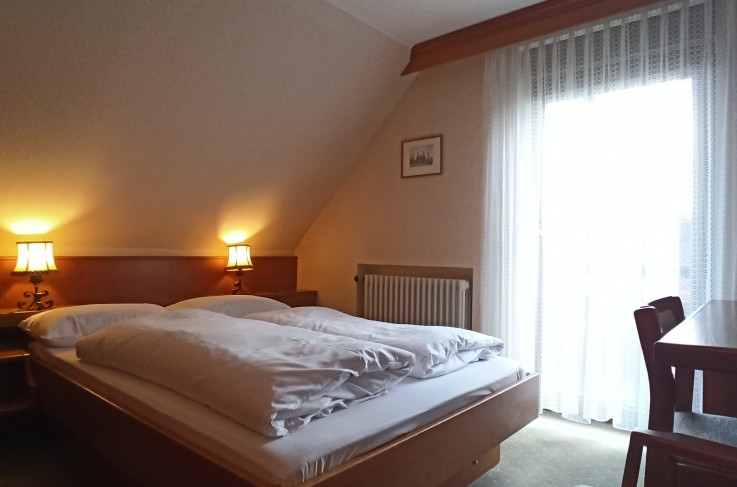 Compacte Tweepersoonskamer met balkon